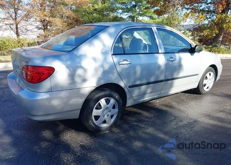2004 Toyota Corolla Ce z USA, uszkodzony, nr VIN 2T1BR32E64C302574
